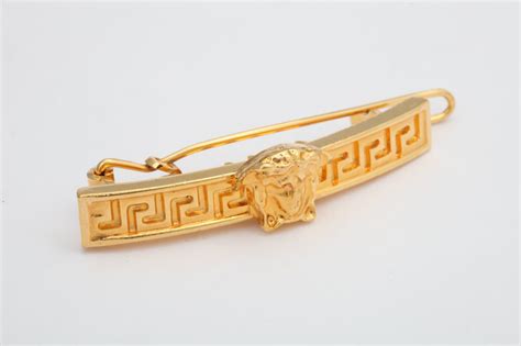 versace hair clip fake|versace hair brooch.